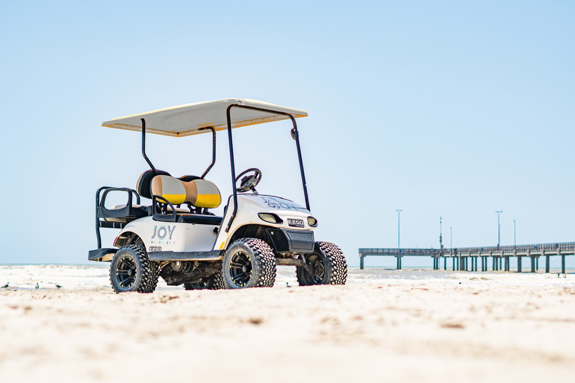 Four passenger E-Z-GO golf cart on Port Aransas beach