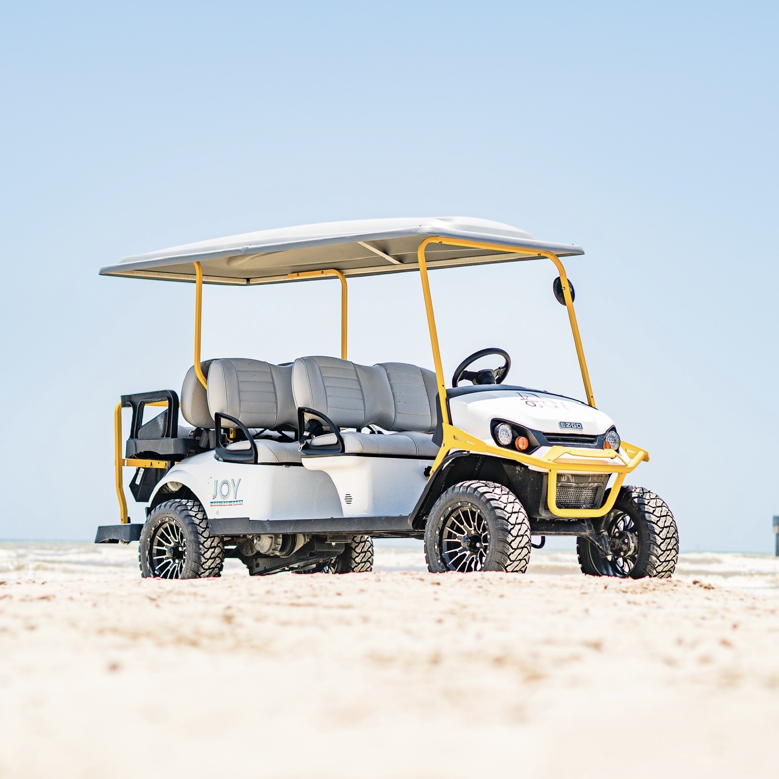 Six passenger E-Z-GO golf cart on Port Aransas beach